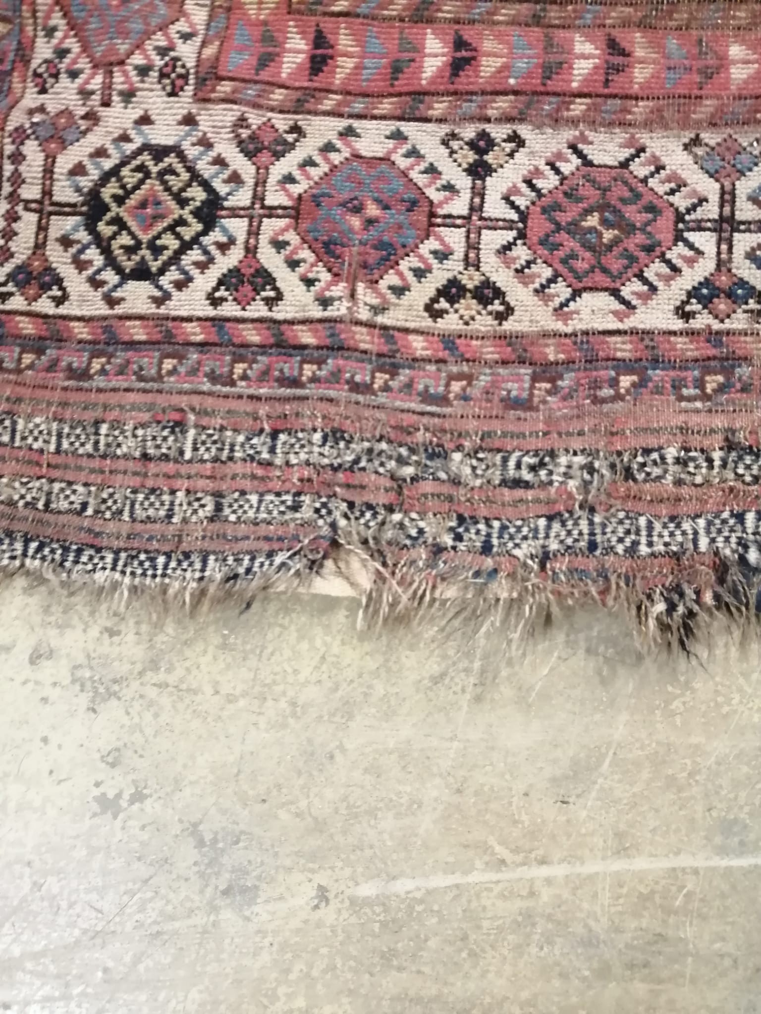 An antique Khamseh rug, 290 x 136cm